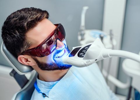 Teeth Whitening Procedure with Young Man — Hollywood, FL — Desired DentalMed Services
