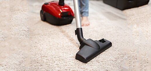 Maid Cleaning Carpet — Vacuum Center in Seattle, WA Maid Cleaning Carpet — Vacuum Center in Seattle, WA