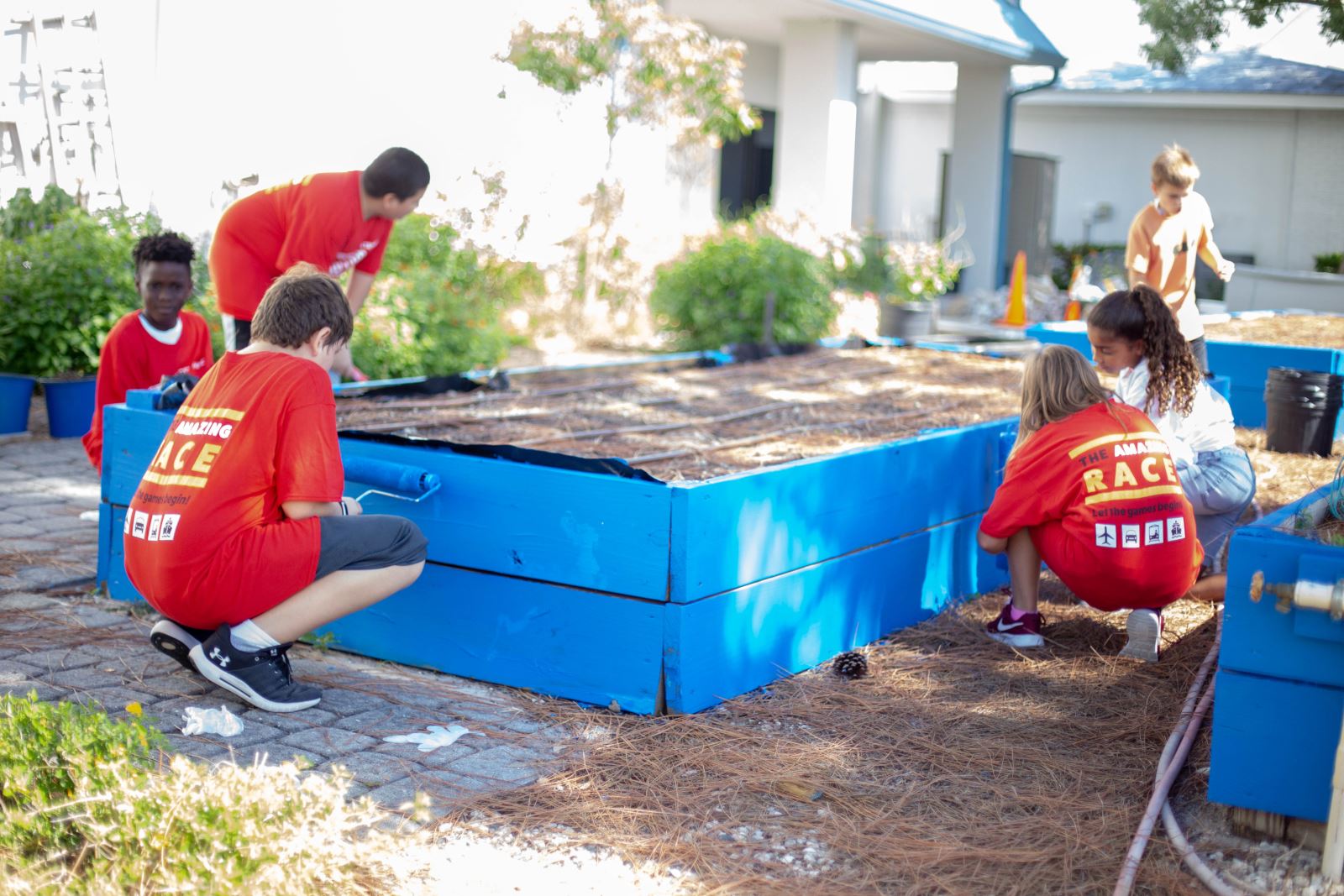 kids planting garden