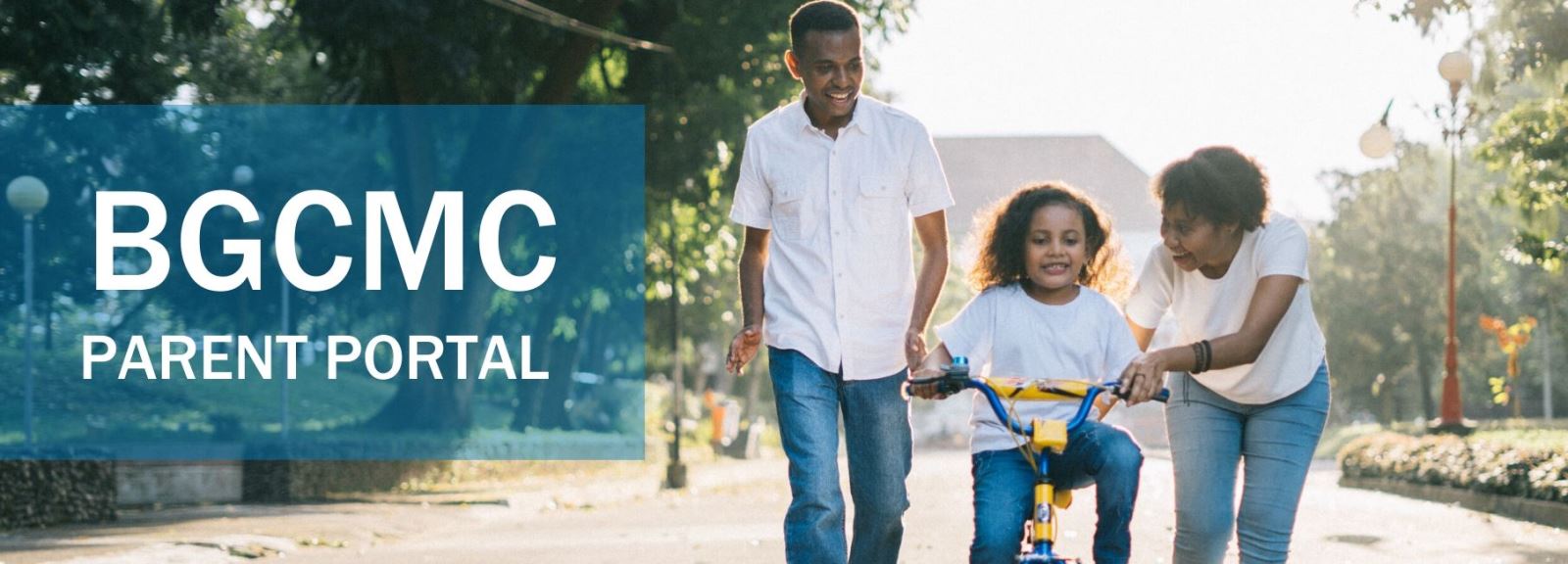 image of parents and girl riding bike