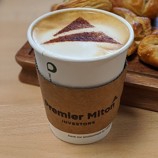 Branded coffee cups in black ink