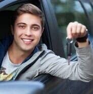 Man Holding Keys — Driving Lessons in Yorktown, VA Man Holding Keys — Driving Lessons in Yorktown, VA