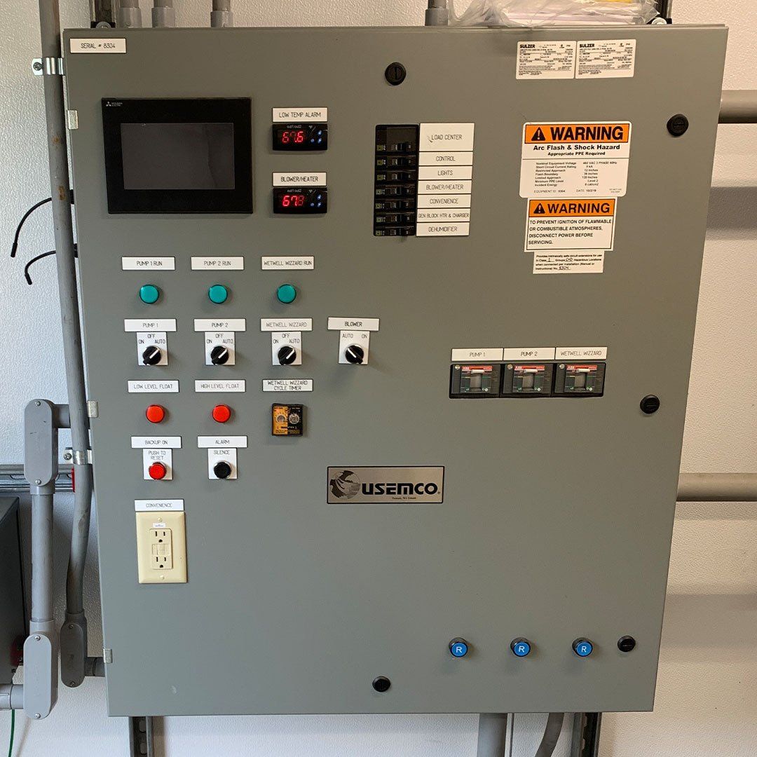 A control panel with a warning label on it