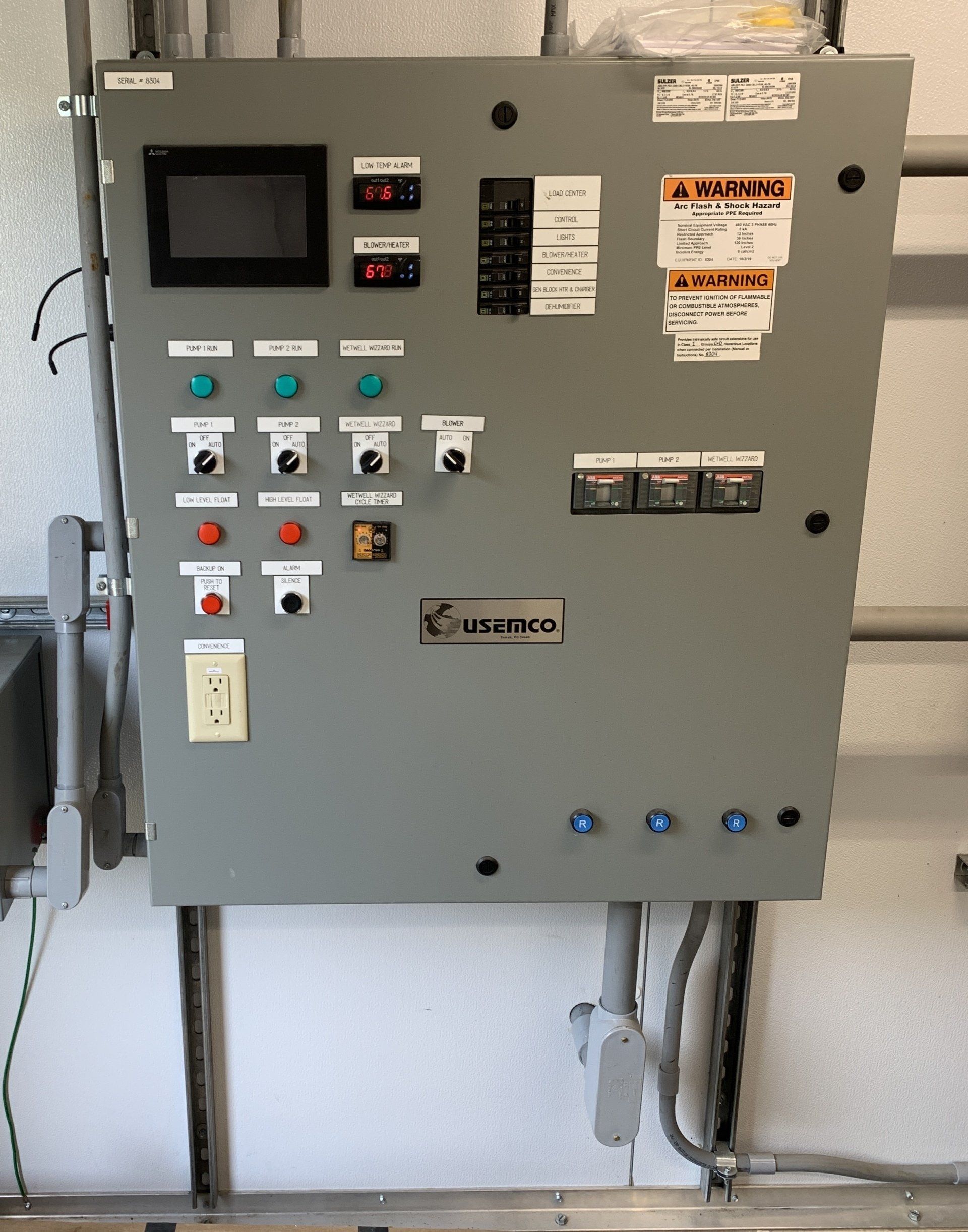 A control panel with a warning label on it