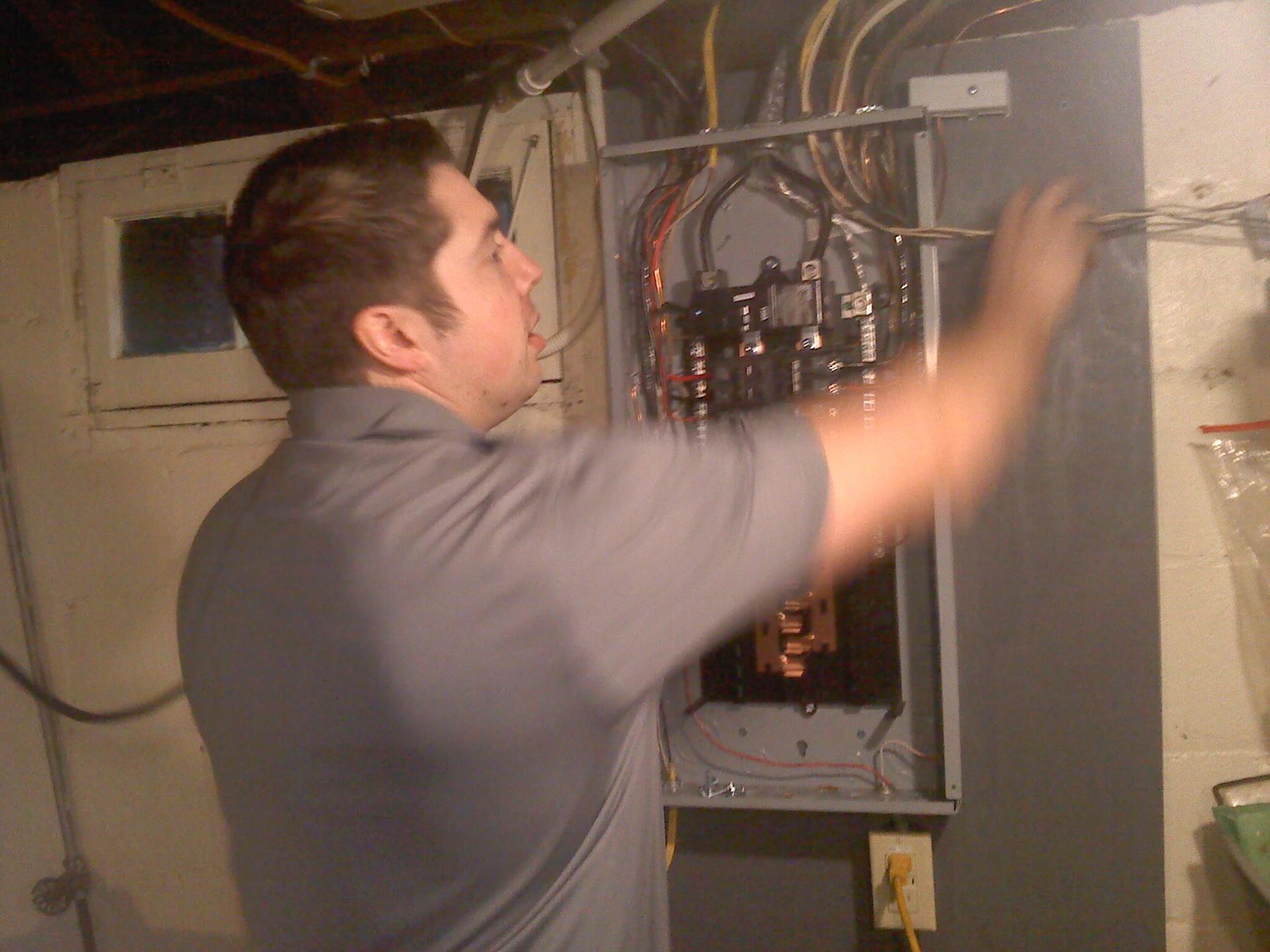 Man fixing wires — New Construction in Beaver, PA