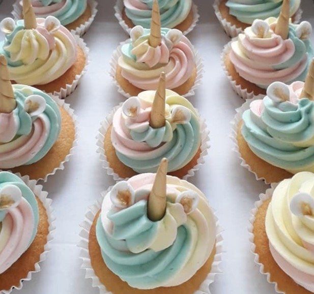 12 unicorn rainbow buttercream cupcakes created by A Cherry On Top, Isle of Wight.