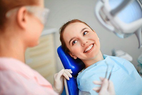 Sealants Young Woman at the Dentist | Cosmetic Dentist Endicott