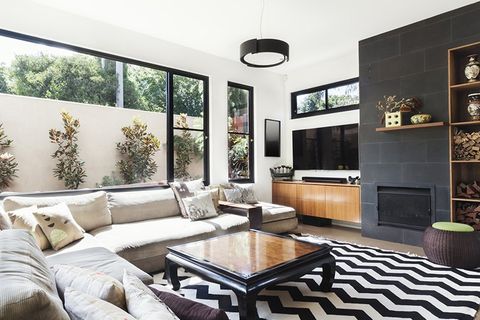 Bathroom Design and Living Room Design Services in San Diego, CA — Monochrome Living Room With Wood and Grey Tiling Accents