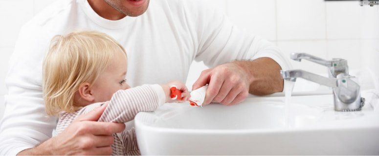 Family at Sink