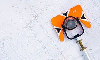 Orange Theodolite Prism - Land Survey in Clearfield, PA Orange Theodolite Prism - Land Survey in Clearfield, PA
