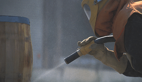 pressure washing a barrel