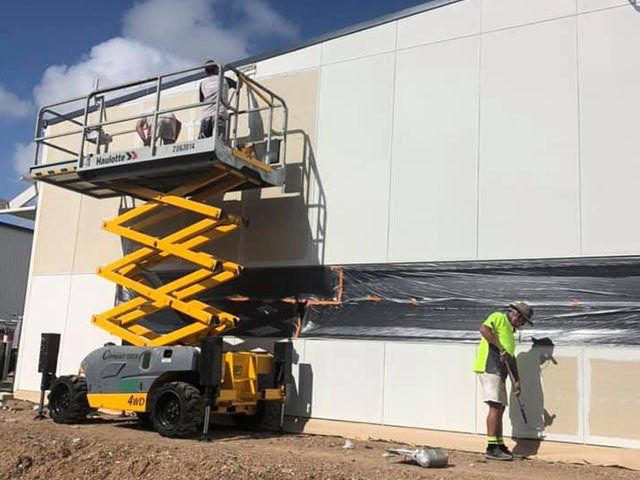 Paint Service On Warehouse — Classic Coatings Australia on the Fraser Coast QLD