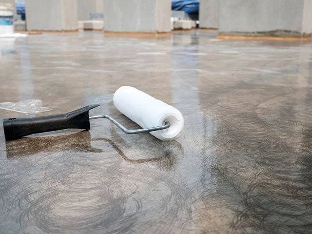 Epoxy Flooring Coating — Classic Coatings Australia In Hervey Bay QLD Epoxy Flooring Coating — Classic Coatings Australia In Hervey Bay QLD