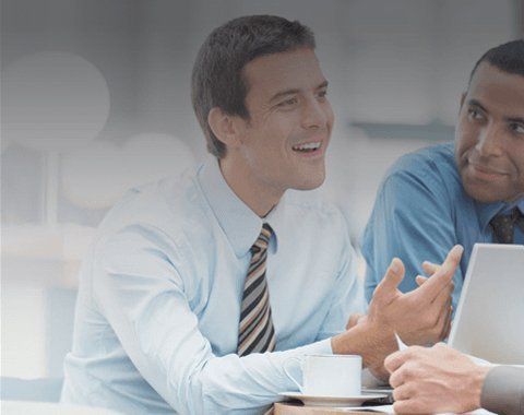 2 men in a meeting room