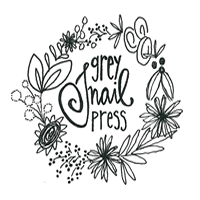 a black and white logo for grey trail press with flowers and leaves .