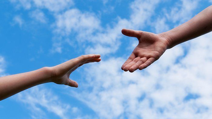 picture of hands reaching out
