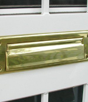 White Security Door with Mail Box — Detroit, MI — Protector Window & Door White Security Door with Mail Box — Detroit, MI — Protector Window & Door