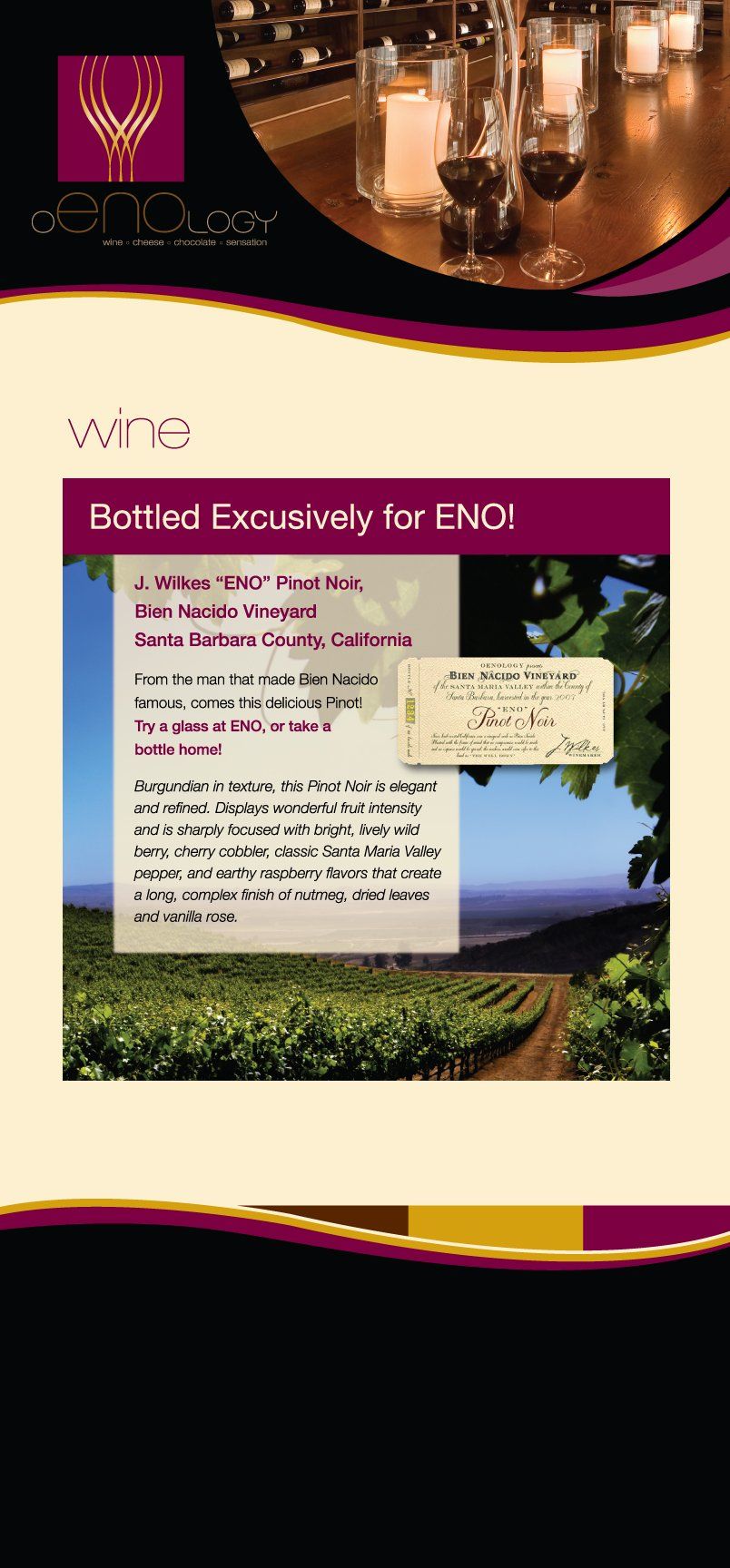 An advertisement for a winery with a picture of a vineyard and wine glasses.