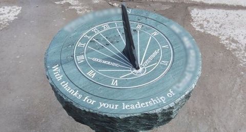 Light green slate engraved sun dial Light green slate engraved sun dial