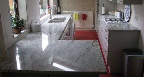 Glacier white with polished sink and double drainer grooves Glacier white with polished sink and double drainer grooves