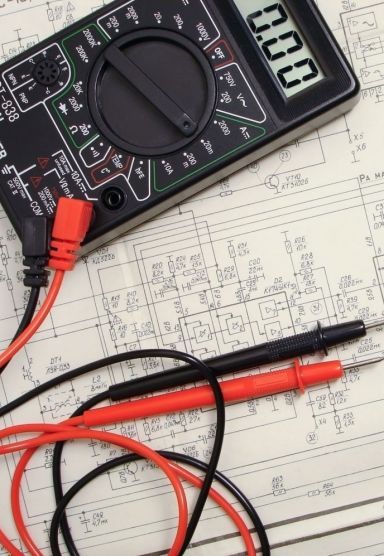 Volt meter and schematic our experts use to maintain electrical safety in Sydney