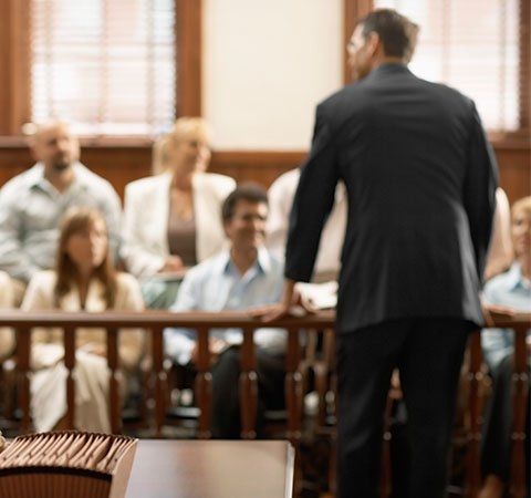 Wrongful Death Suit — Man in Suit in Courtroom in Hampton Roads, VA Wrongful Death Suit — Man in Suit in Courtroom in Hampton Roads, VA