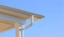 Guttering, fascias & soffits available in Bilston in the West Midlands Guttering and fascia on the edge of a roof