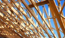 Timber roofing products available in Bilston in the West Midlands Timber roof beams on an unfinished roof