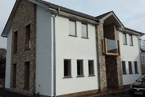 Home exterior with tiled roofing
