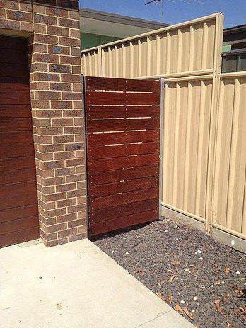 colorbond fencing around home Colorbond fencing installed around a home in Holbrook.