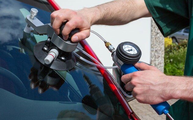 Repairing windshield from stone chipping damage — Auto glass repair in Fargo,, ND Repairing windshield from stone chipping damage — Auto glass repair in Fargo,, ND