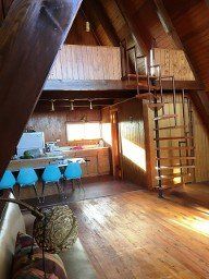 Living room, kitchen, spiral stairs