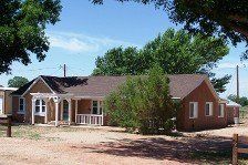 SOLD: Valley Home on 15 irrigated acres, horse stalls, barns, etc.