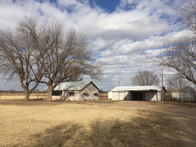 SOLD: Valley Home on 15 irrigated acres, horse stalls, barns, etc.