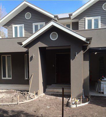 tall grey house