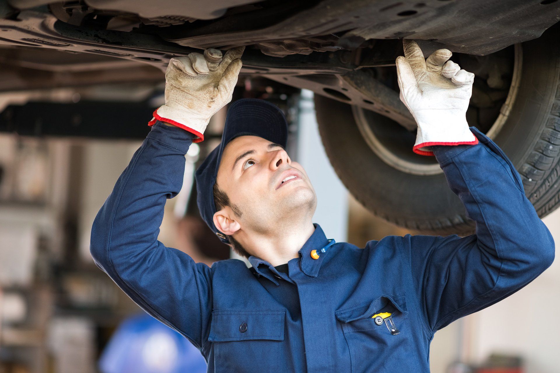 Mechanic Checking The Car Condition — Cape Girardeau, MO — DL Transmissions