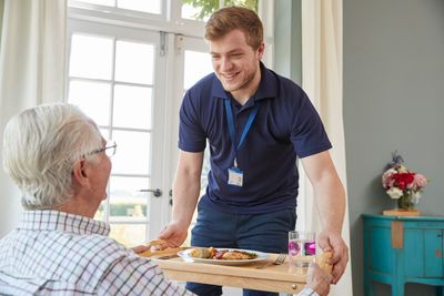 Giving a Food to the Senior — Natchez, MS — Heart2Heart Homecare Services, INC. Giving a Food to the Senior — Natchez, MS — Heart2Heart Homecare Services, INC.