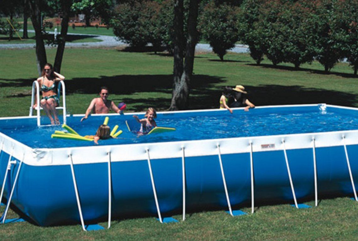 A Family Plays in an Above Ground Splash Superpool. Purchase Your at Columbia Pool & Spa in Mid-Mo.