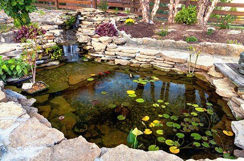 Pond In Gardeb — Greer, SC — Smith Irrigation & Landscaping Pond In Gardeb — Greer, SC — Smith Irrigation & Landscaping