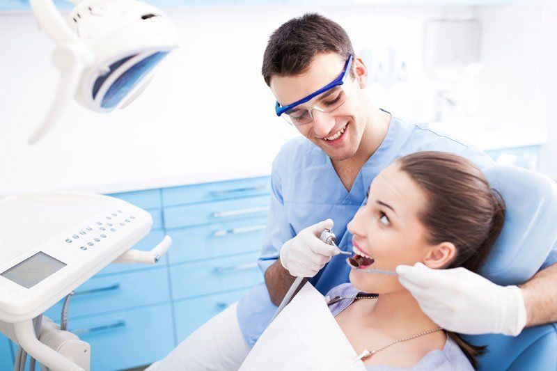 Dentist with patient