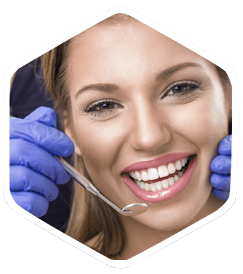 Woman Smiling in Dental Chair