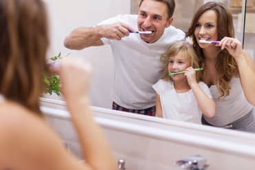 Family brushing their teeth - Dental Care in Haute, IN Family brushing their teeth - Dental Care in Haute, IN