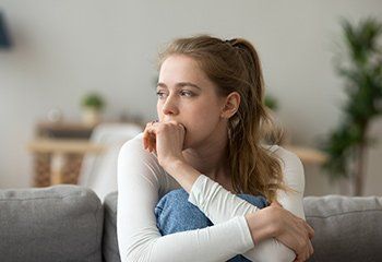 Anxiety — Woman Biting Her Nails in Columbus, GA Anxiety — Woman Biting Her Nails in Columbus, GA