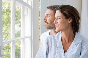 couple in the window - Indoor crassula plant in pot on window sill - Vinyl Window in Passaic, NJ couple in the window - Indoor crassula plant in pot on window sill - Vinyl Window in Passaic, NJ