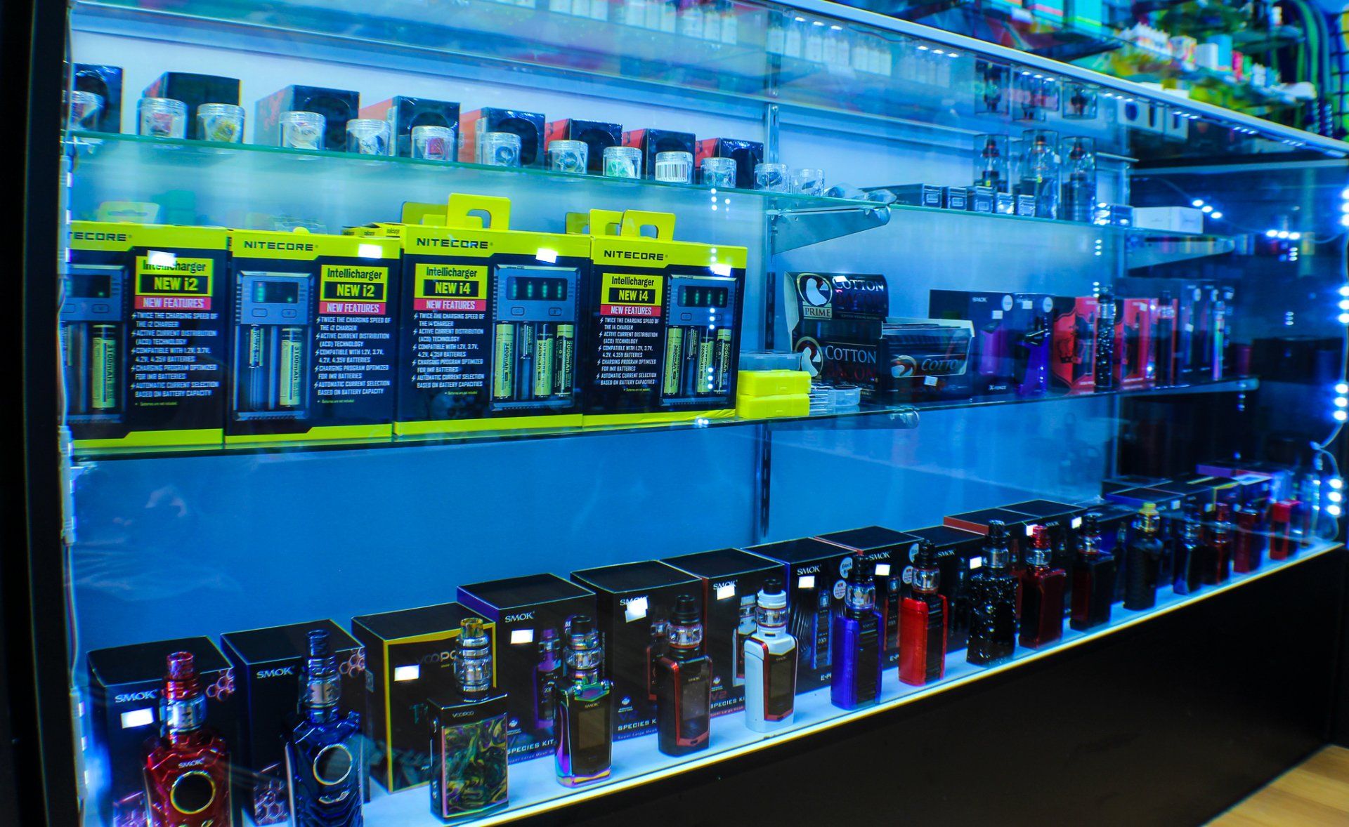 A display case filled with a variety of electronic cigarettes.