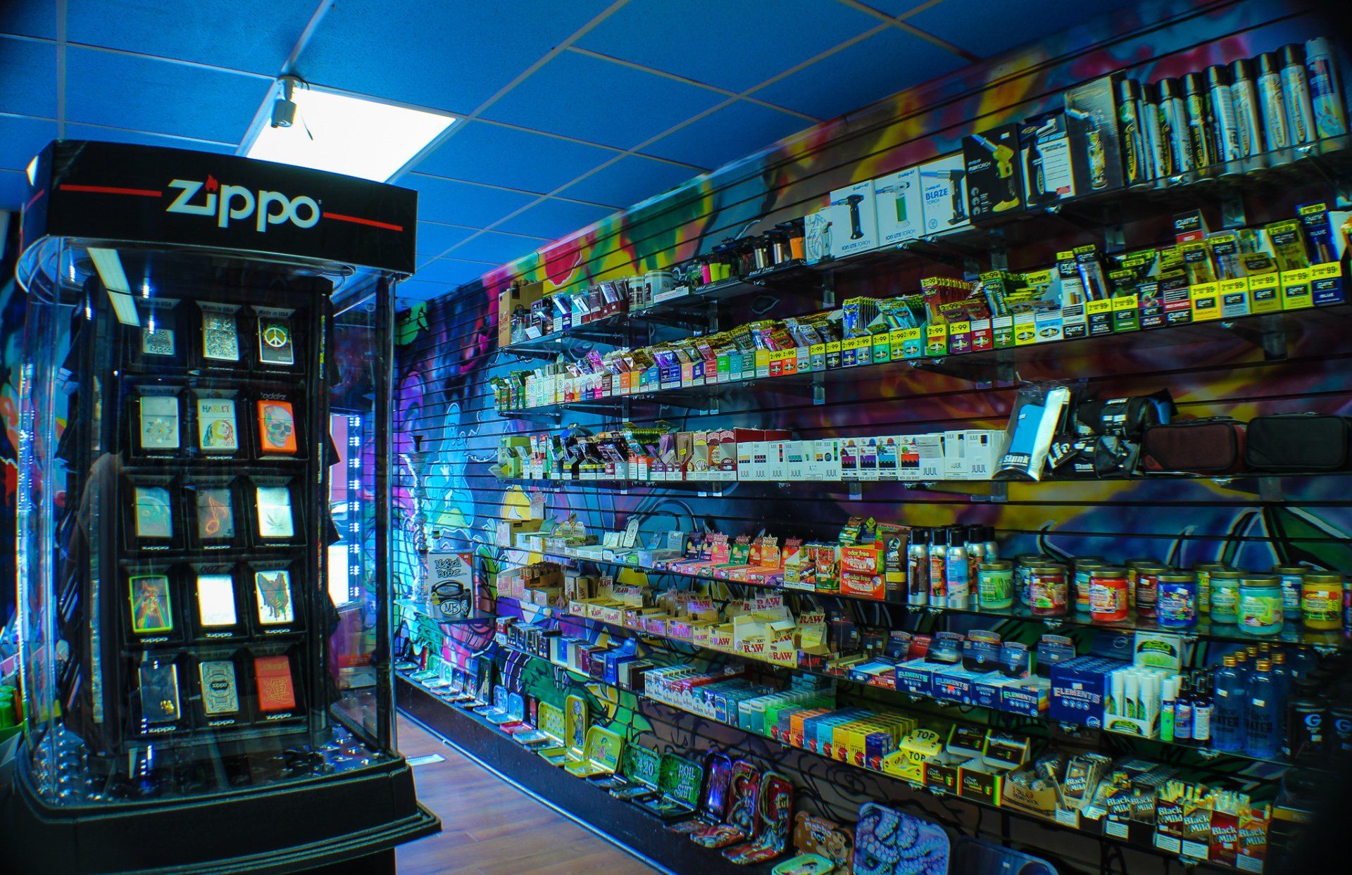 The inside of a store with a zippo display