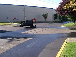 Asphalt Experts — Man at Work in Kent, WA Asphalt Experts — Man at Work in Kent, WA