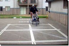 Asphalt — Man on Parking Lot in Kent, WA Asphalt — Man on Parking Lot in Kent, WA