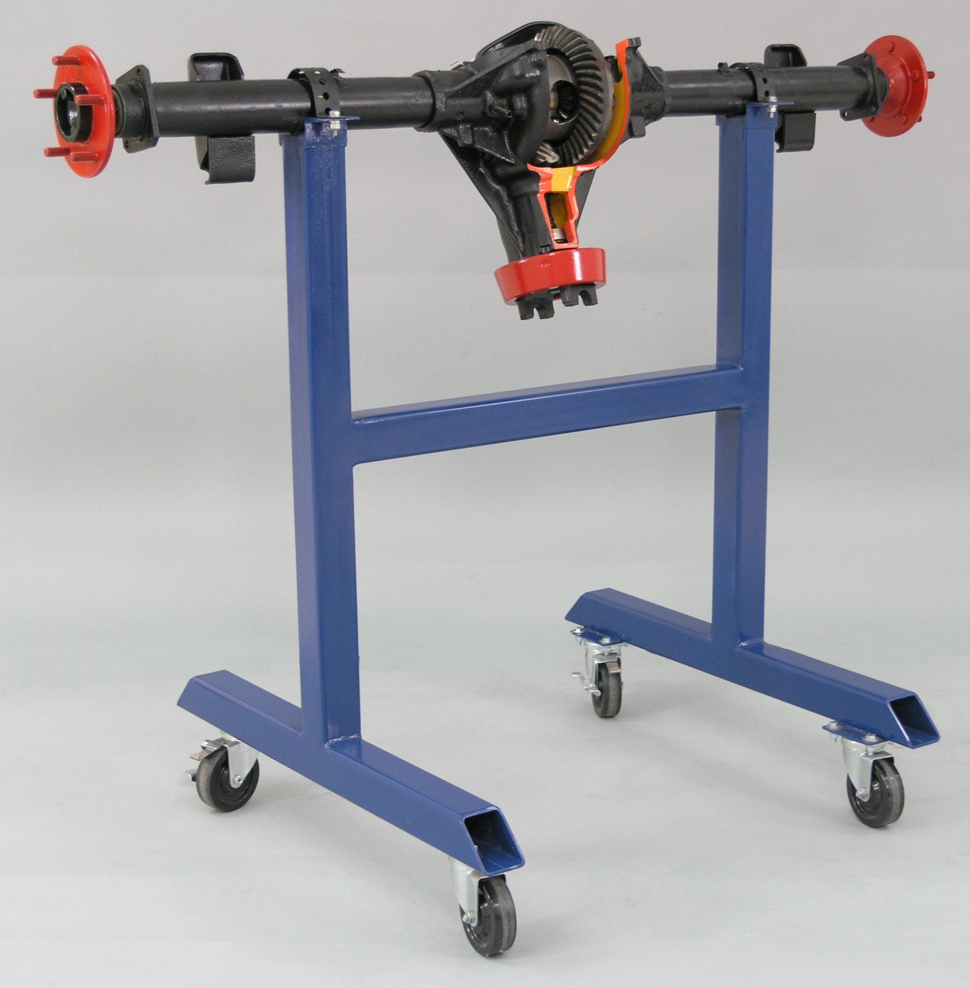 A model of a rear differential on a blue stand with wheels