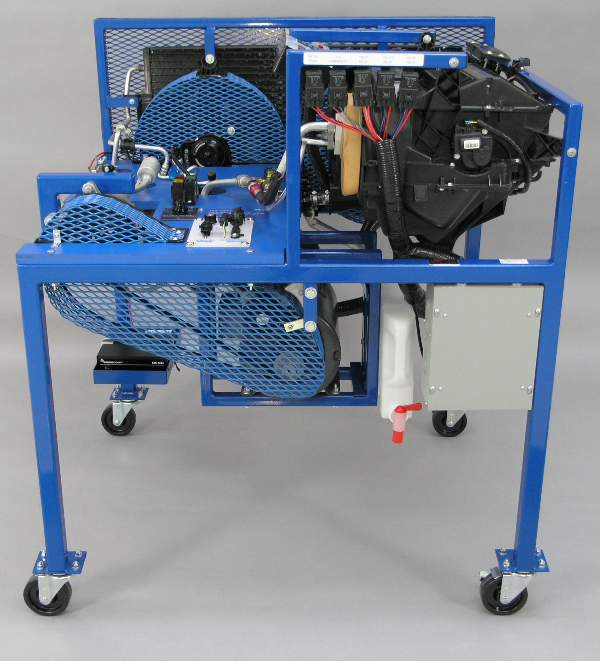 A blue machine with a fan on top of it